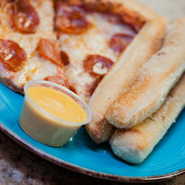 Pizza, Breadsticks and Cheese Sauce