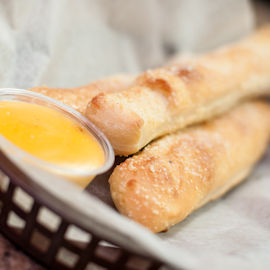 Three Breadstick and cheese sauce